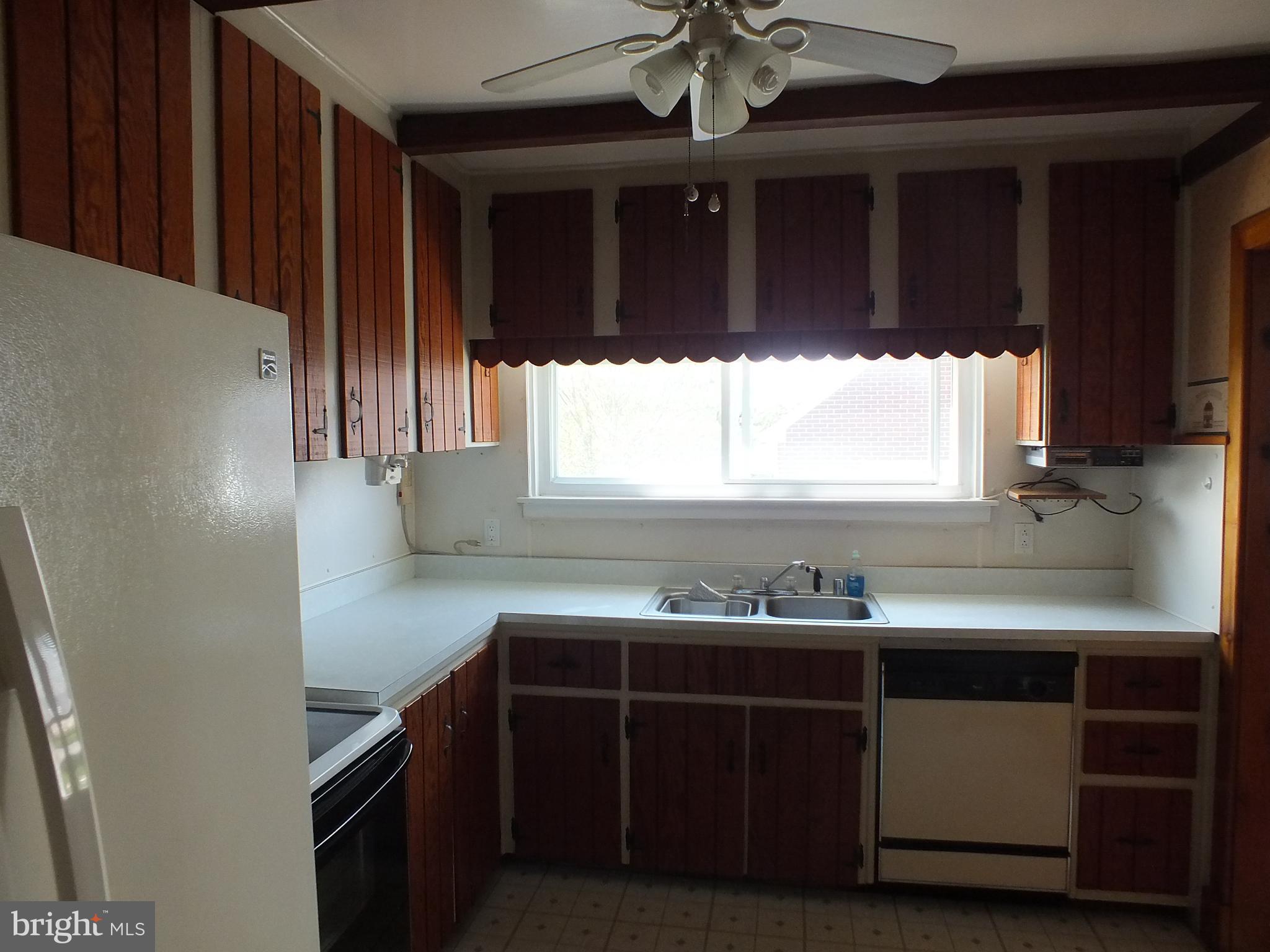 543 Poole Road Westminster, MD 21157 - Photo 12 of 31 This kitchen is compact yet cozy.
