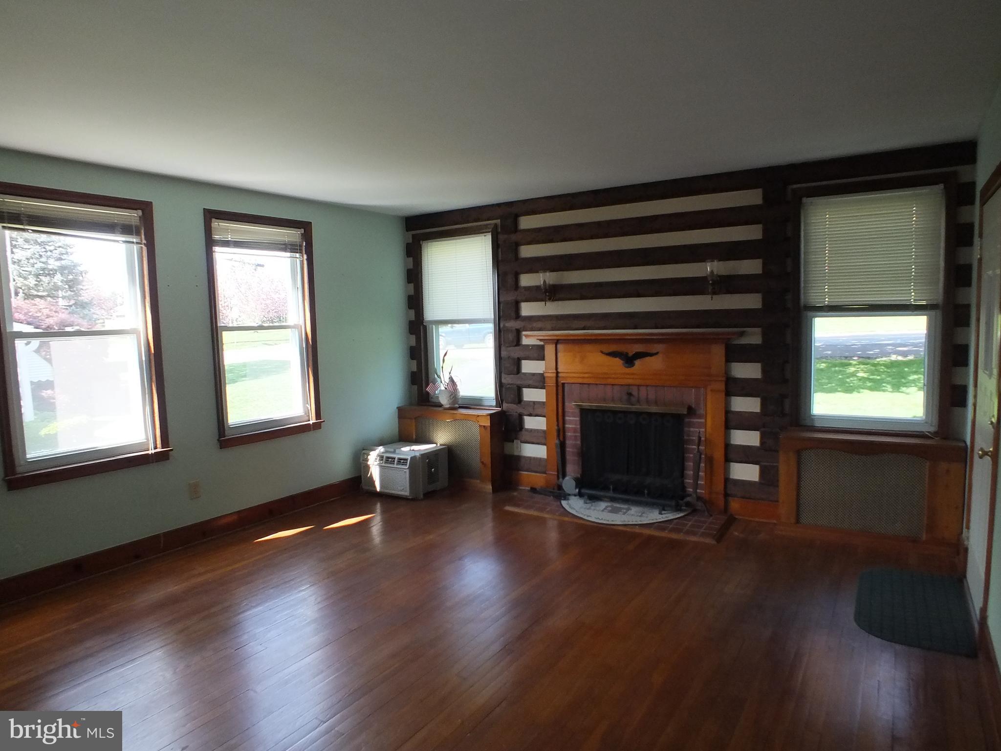 543 Poole Road Westminster, MD 21157 - Photo 8 of 31 Hardwood floors in the living room look great!