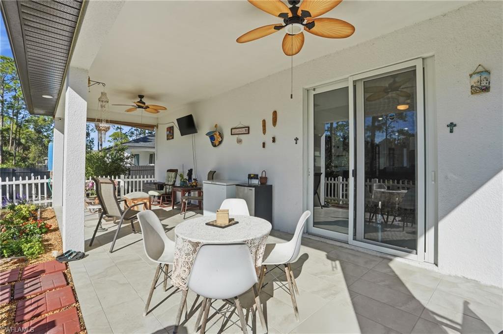 3409 64th Street West Lehigh Acres, FL 33971 - Photo 29 of 44 a view of a dining room with furniture window and outside view