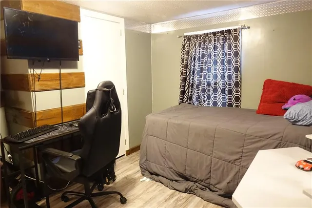 a view of a car parked in front of a house