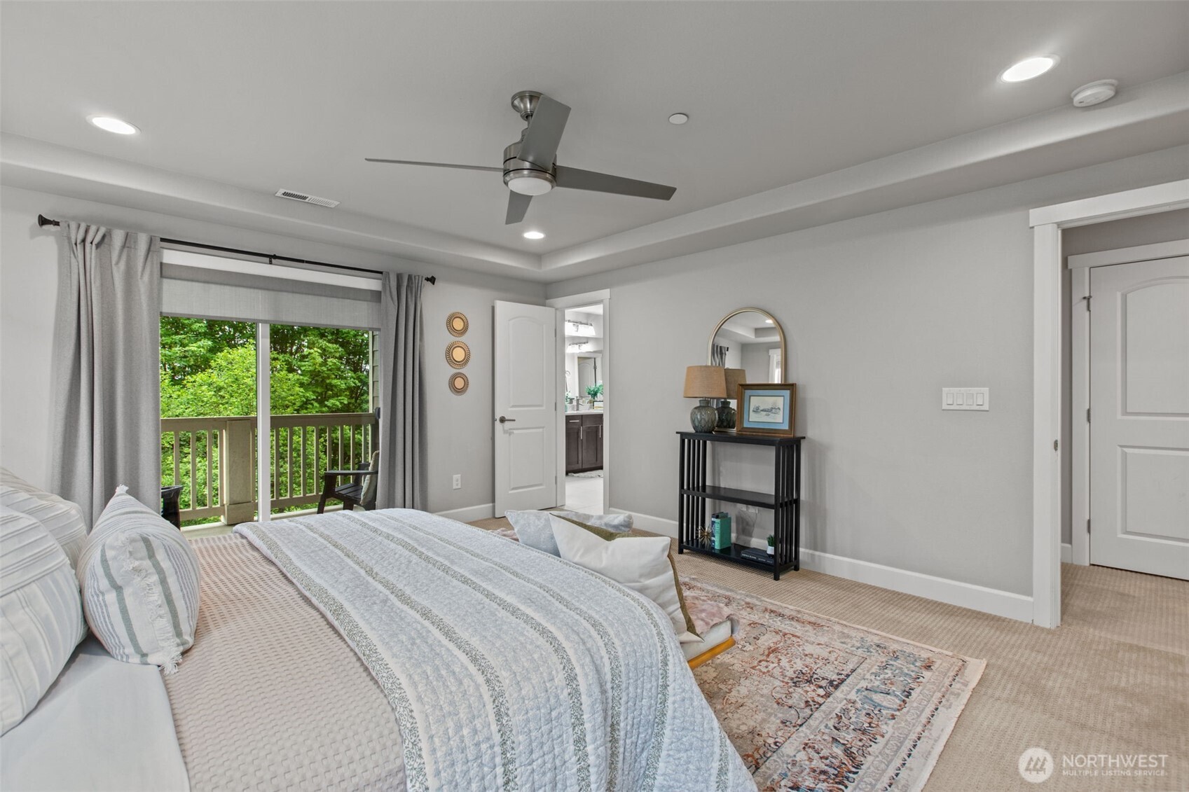18231 3rd Drive Southeast Bothell, WA 98012 - Photo 16 of 40 a bedroom with a large bed and a large window