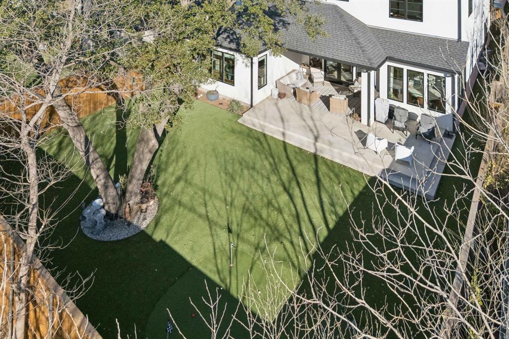 8427 Midway Road Dallas, TX 75209 - Photo 35 of 37 a view of swimming pool with a yard