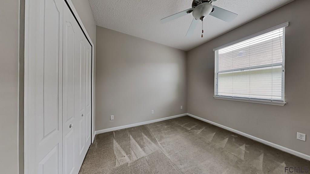 1504 Valhalla Way St. Augustine, FL 32092 - Photo 12 of 16 a view of an empty room with a window