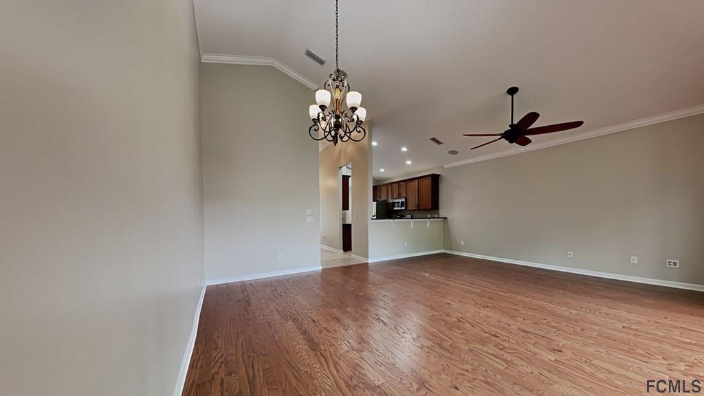 1504 Valhalla Way St. Augustine, FL 32092 - Photo 2 of 16 a view of a kitchen with a sink and a chandelier