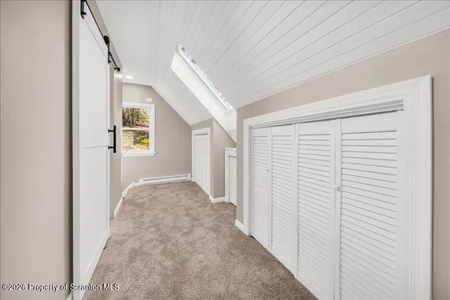 a view of a livingroom with an entryway