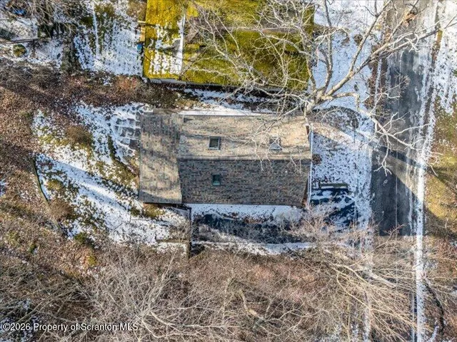 a view of a bench in a backyard