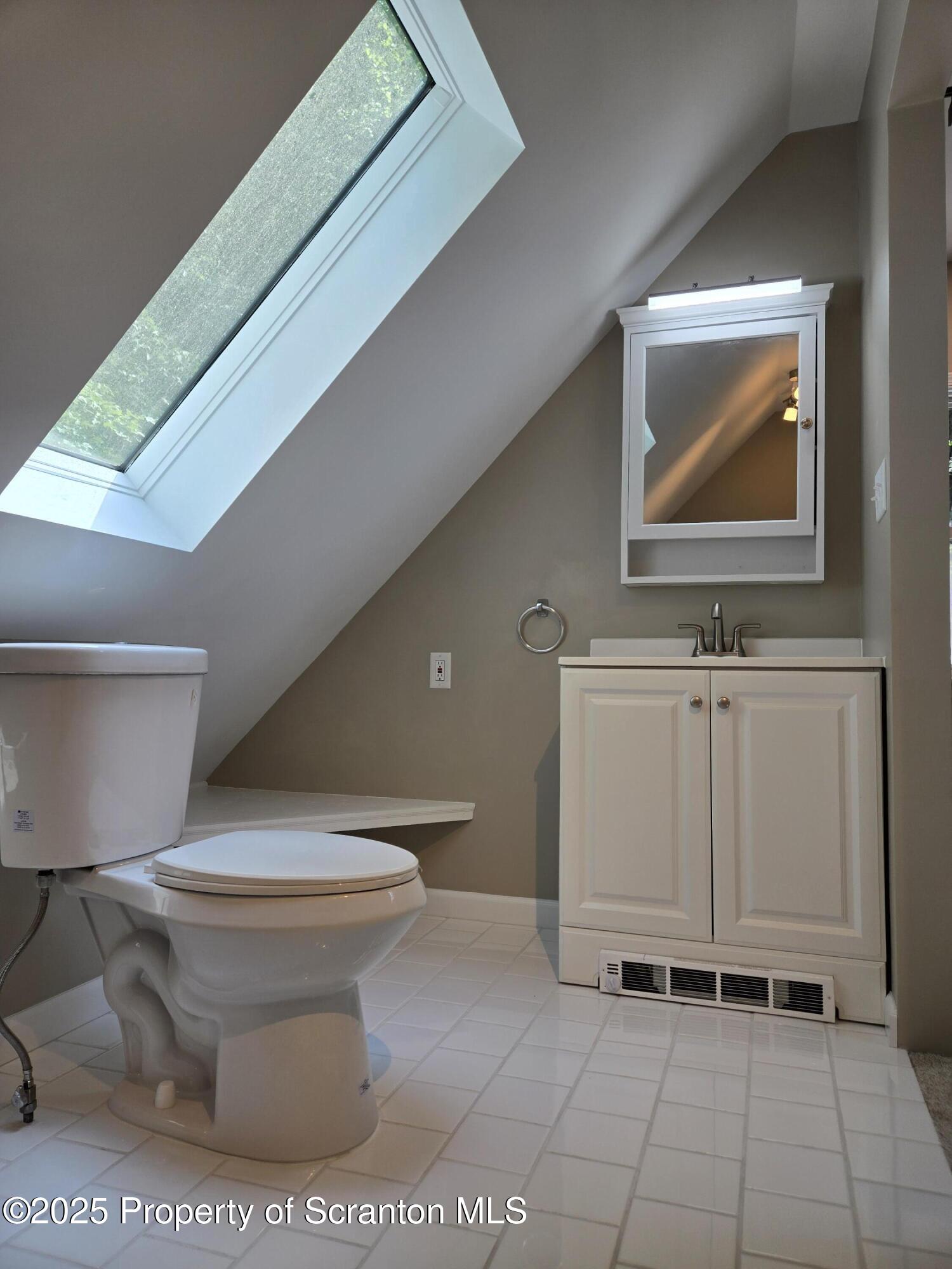 134 Chestnut Street Factoryville, PA 18419 - Photo 29 of 33 a bathroom with a toilet and a sink