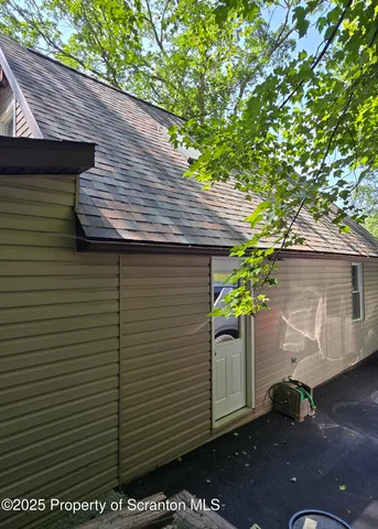 a view of a back yard of the house