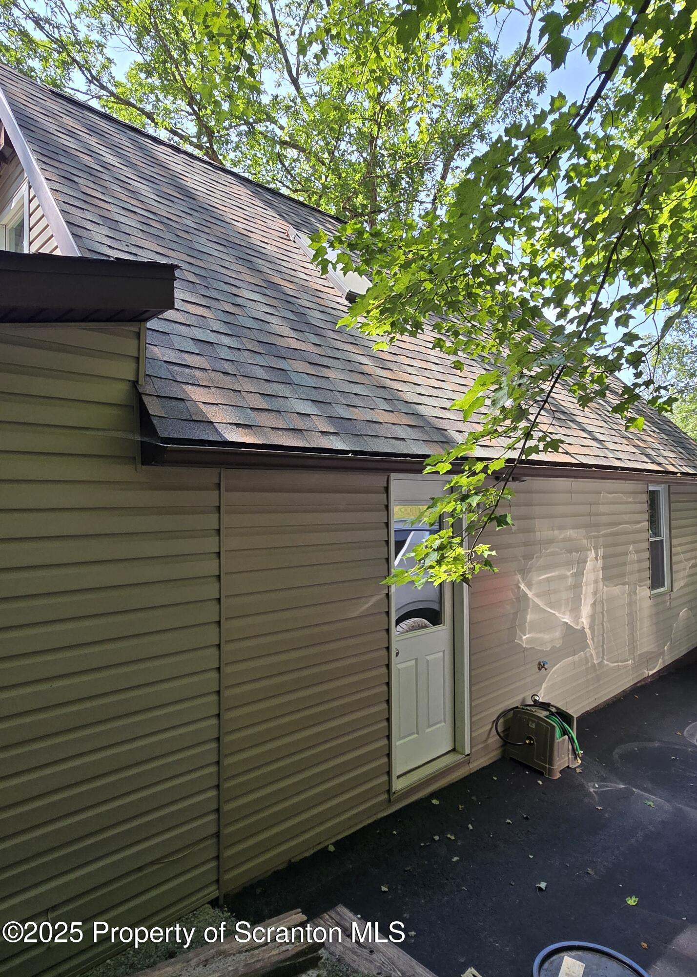 134 Chestnut Street Factoryville, PA 18419 - Photo 10 of 33 a view of a back yard of the house