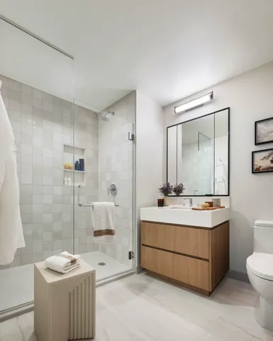 a bathroom with a tub sink mirror and toilet