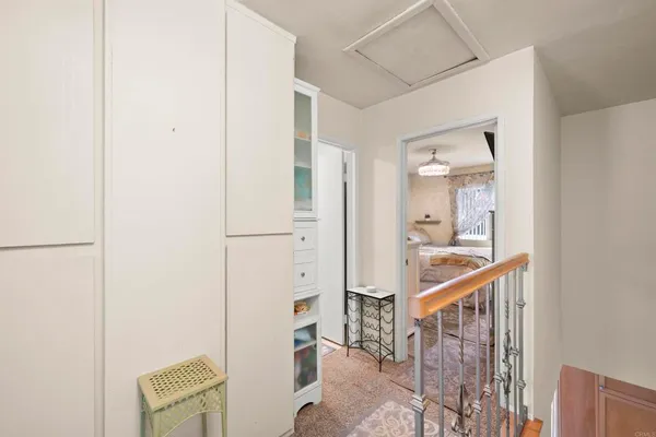 a car parked in front of white house