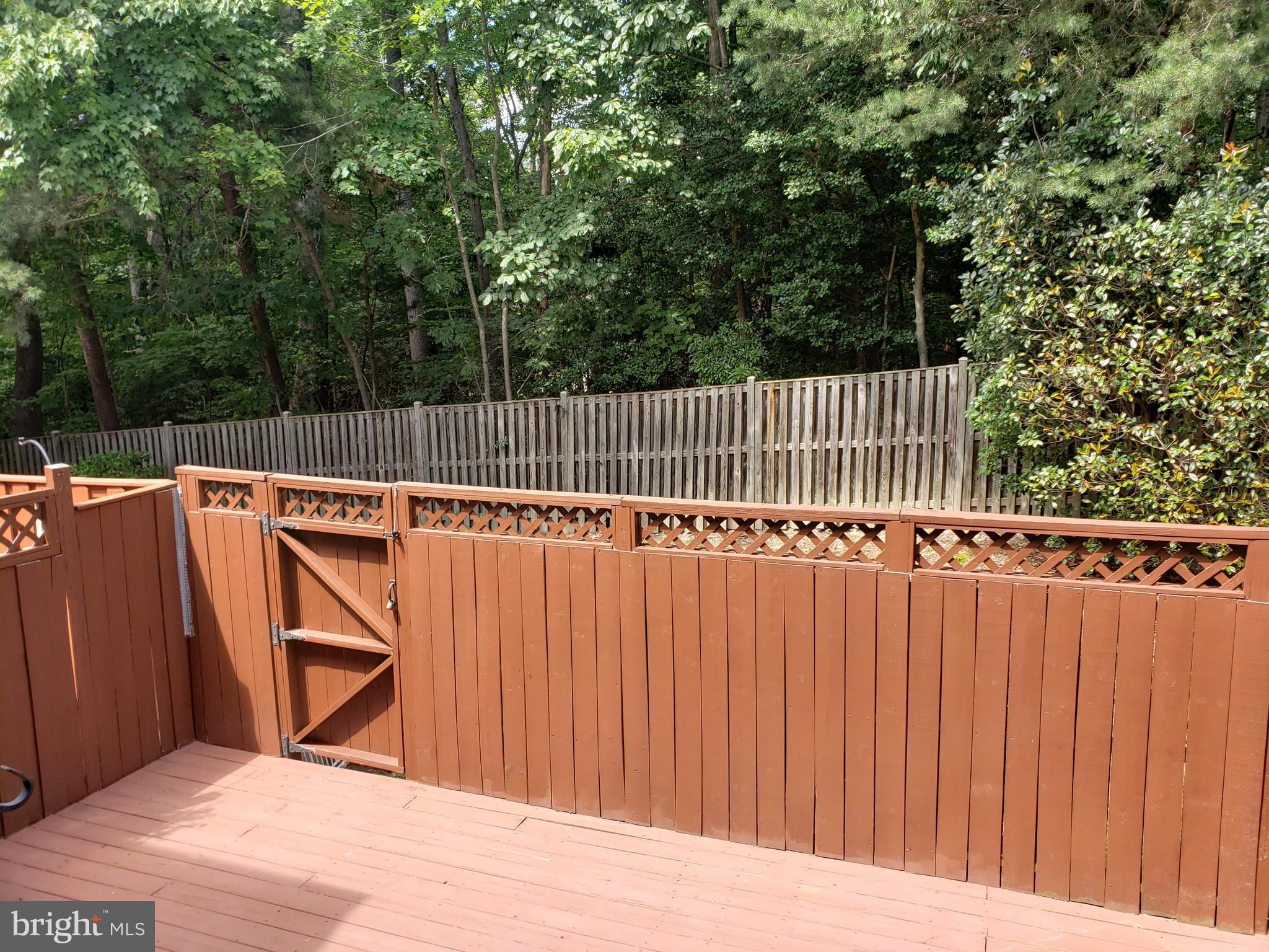 12852 Silvia Loop Woodbridge, VA 22192 - Photo 19 of 20 Fenced in yard backs to woods
