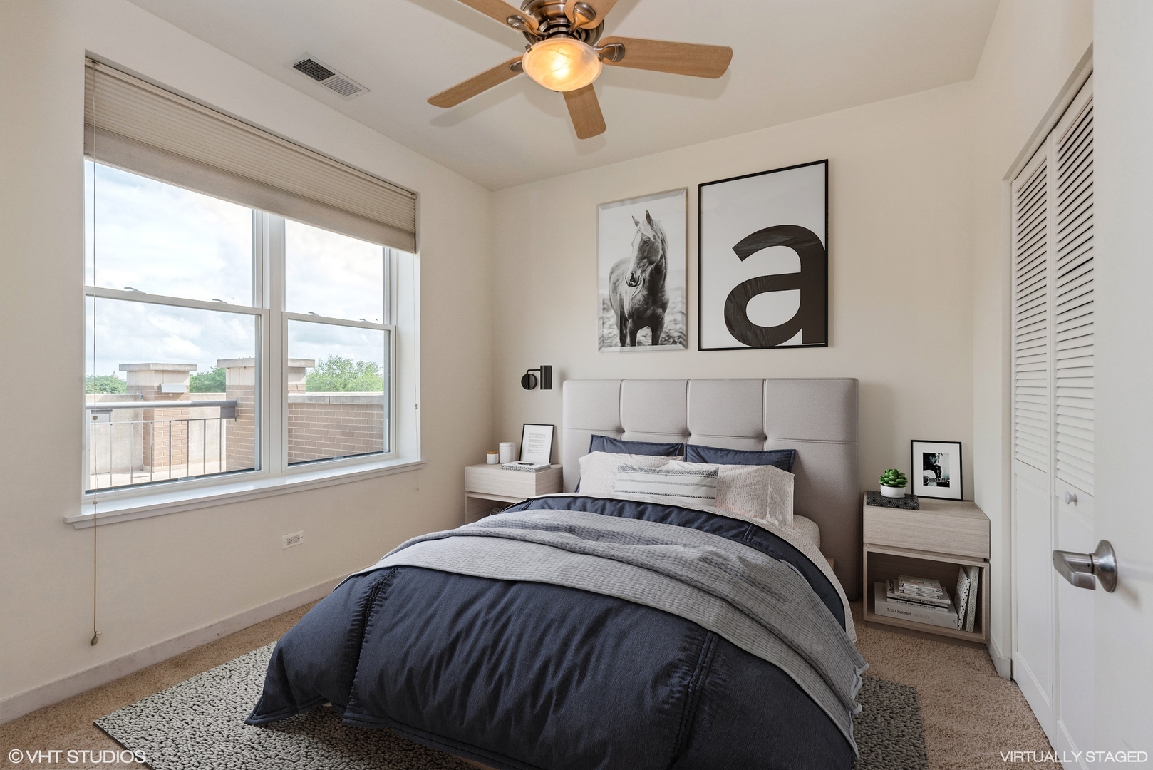 2510 West Irving Park Road, Unit 402 Chicago, IL 60618 - Photo 7 of 13 a bedroom with a bed and a window