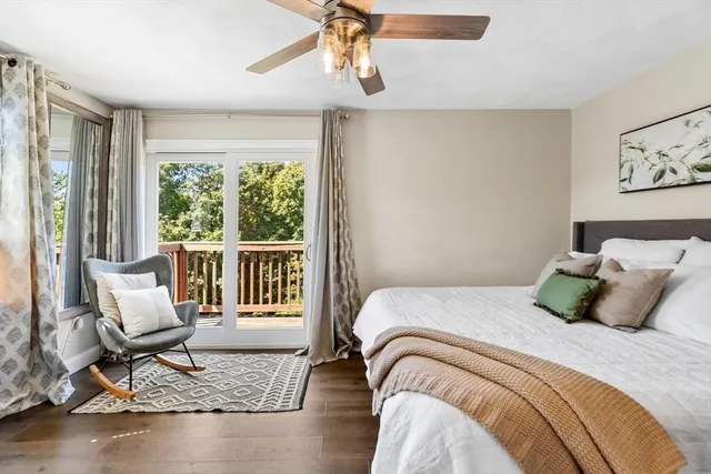 a bedroom with a bed and a desk