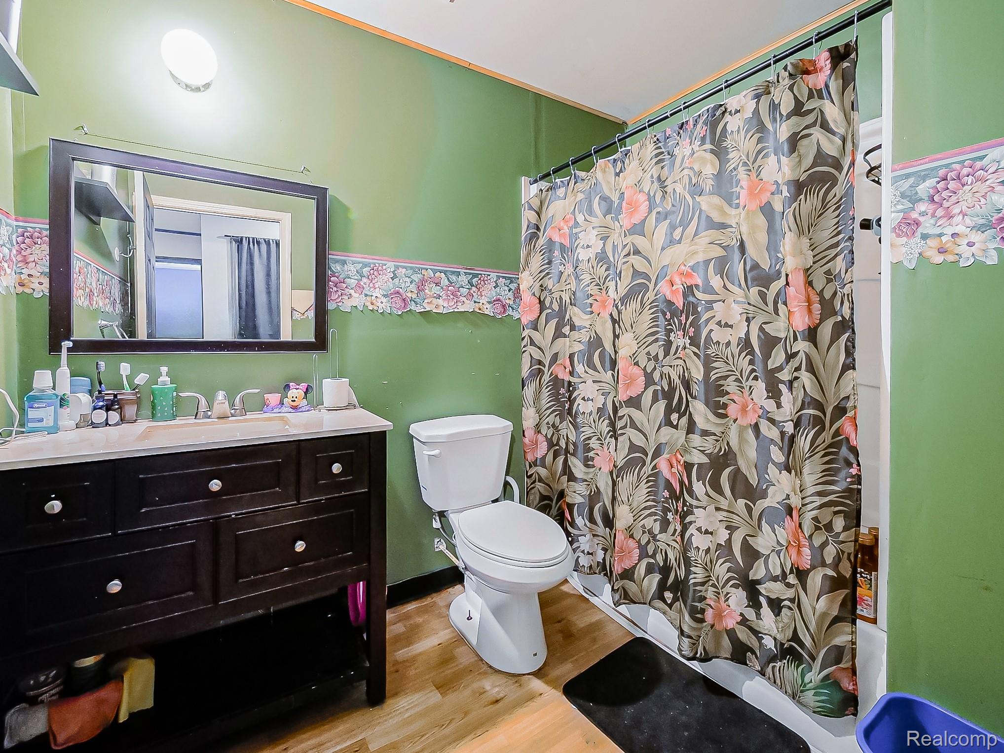 34460 Van Born Road Wayne, MI 48184 - Photo 10 of 31 Full bathroom with vanity and light wood-style flooring