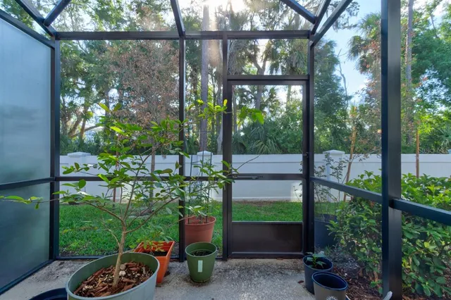 a view of a porch and a yard
