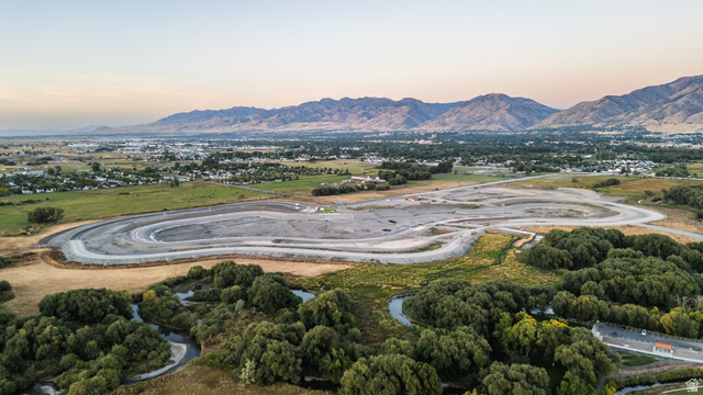 1217 Slalom Circle Drive, Unit 10 Logan, UT 84321 - Photo 4 of 5 Aerial view at dusk of a mountain view
