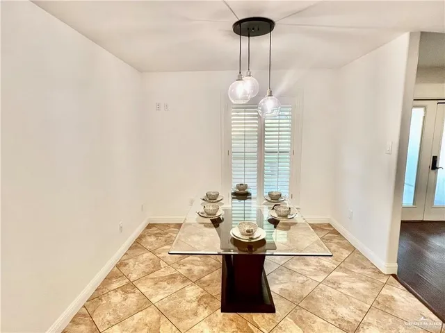 a view of a dining room with furniture