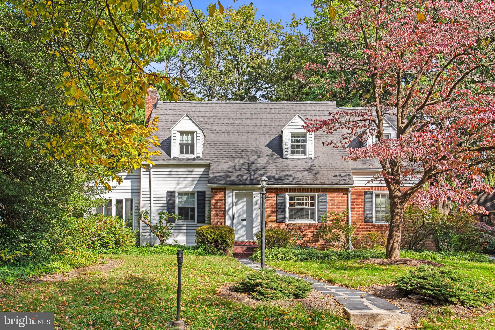 203 Valley Road Harrisburg, PA 17104 - Photo 1 of 38 Charming home nestled among vibrant trees.