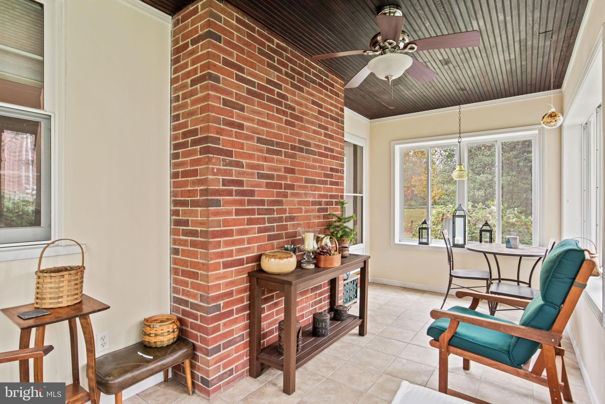 203 Valley Road Harrisburg, PA 17104 - Photo 12 of 38 Charming sunlit space with brick accents.