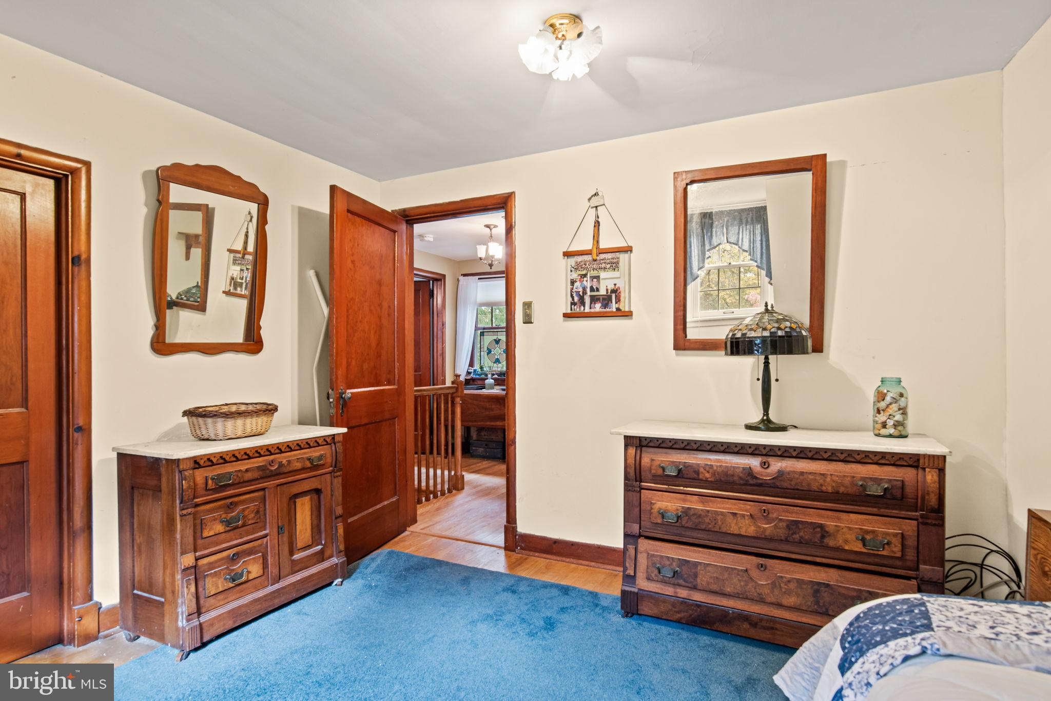 203 Valley Road Harrisburg, PA 17104 - Photo 25 of 38 Charming bedroom with classic wooden accents.