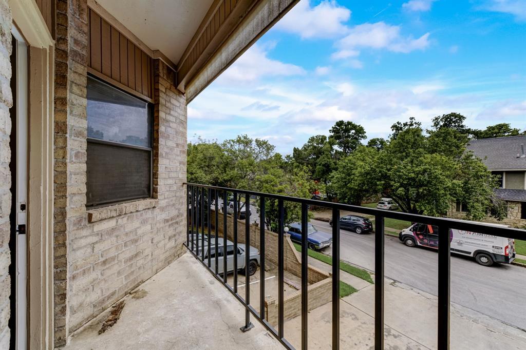 3316 Guadalupe Street, Unit 219 Austin, TX 78705 - Photo 8 of 13 a view of a balcony with an outdoor space