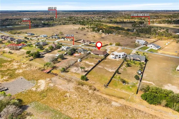 an aerial view of residential building and parking space
