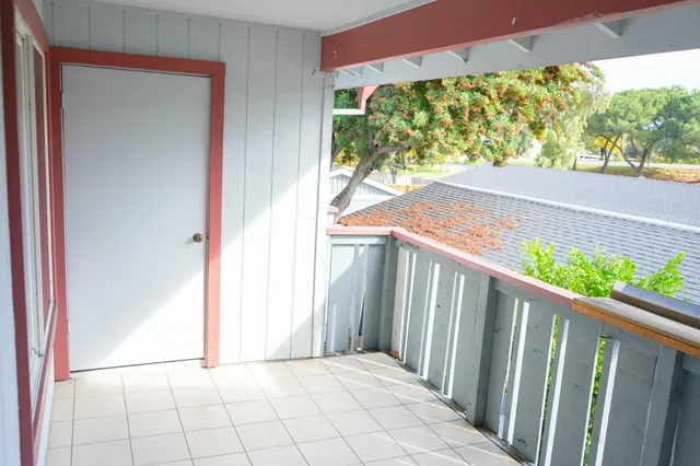 a balcony view with an outdoor space