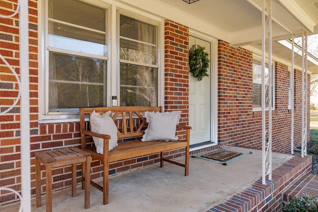 467 Diamond Hill Colbert Road Colbert, GA 30628 - Photo 3 of 50 a bench sitting in front of a house