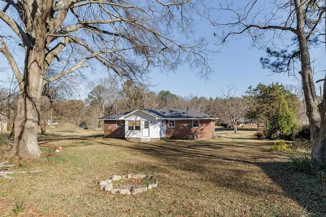 a house view with a outdoor space