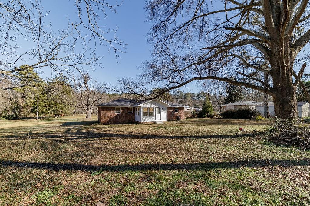 467 Diamond Hill Colbert Road Colbert, GA 30628 - Photo 38 of 50 a front view of a house with a yard