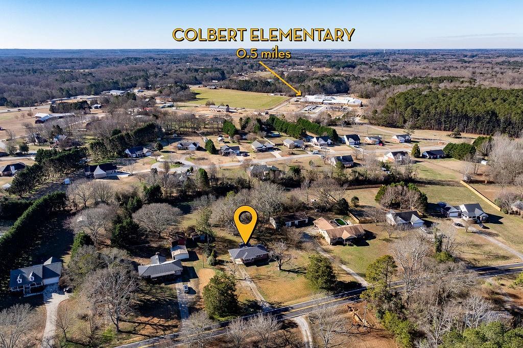 467 Diamond Hill Colbert Road Colbert, GA 30628 - Photo 39 of 50 an aerial view of a city