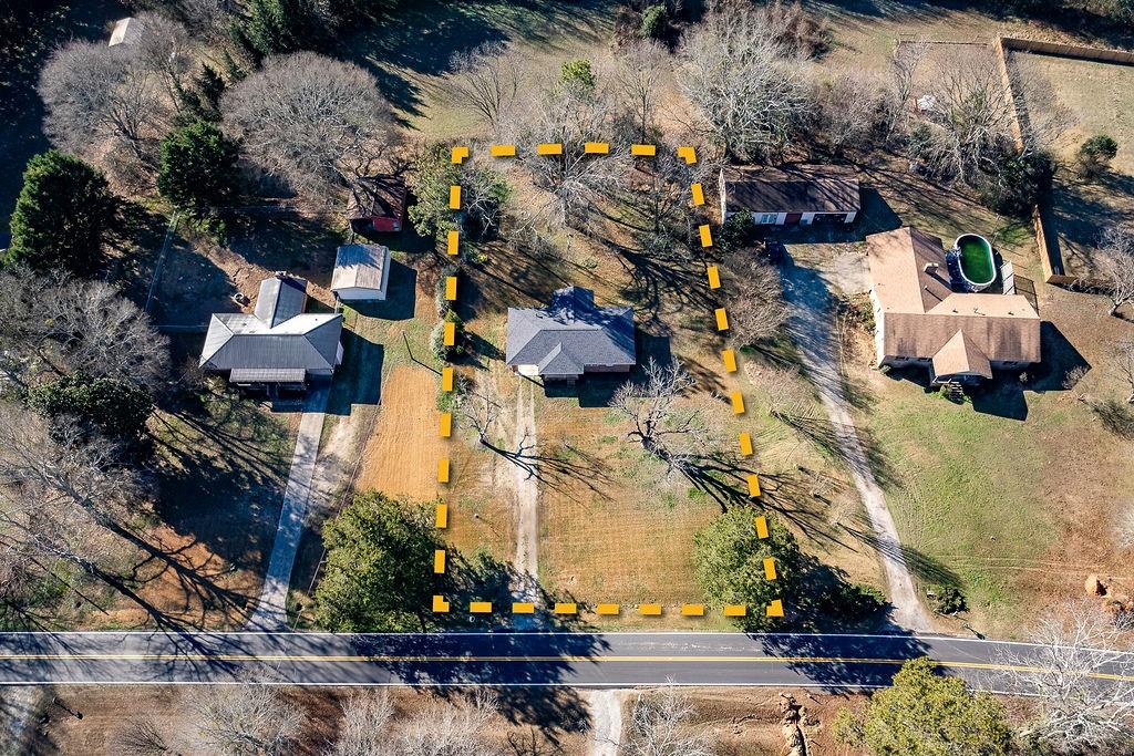 467 Diamond Hill Colbert Road Colbert, GA 30628 - Photo 41 of 50 an aerial view of multiple houses with yard