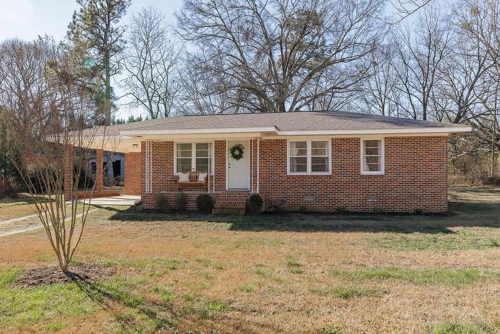 467 Diamond Hill Colbert Road Colbert, GA 30628 - Photo 43 of 50 a view of a house with backyard and sitting area