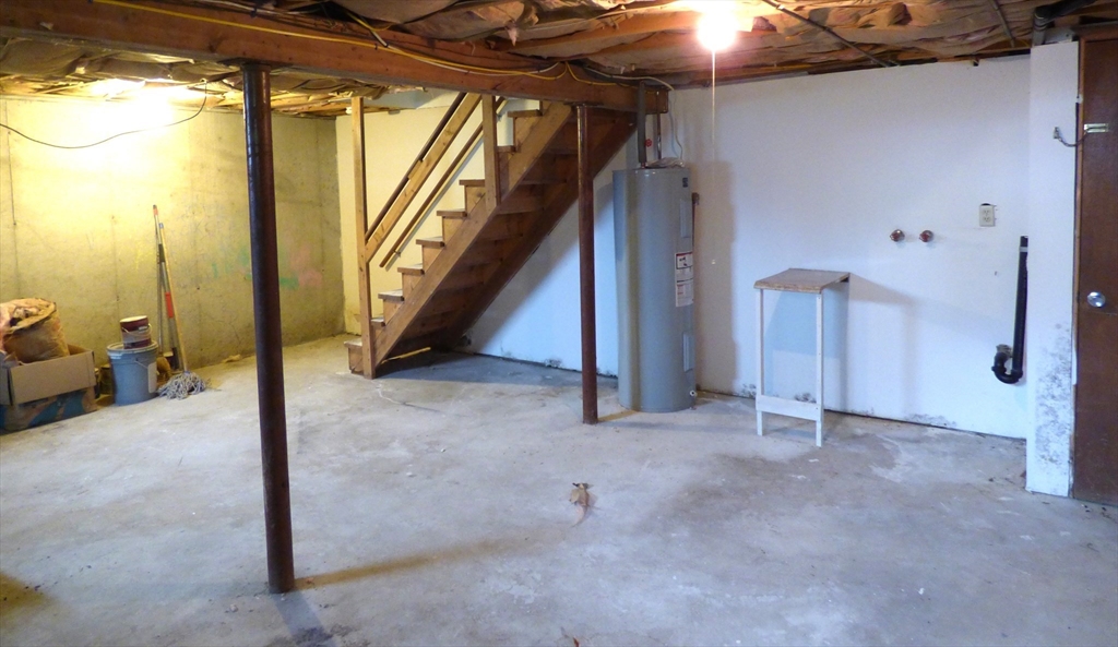 26-28 Daniel Street Springfield, MA 01151 - Photo 14 of 15 a view of an empty room with stairs