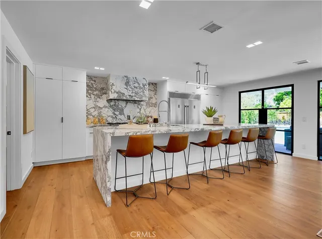 a view of livingroom with furniture and wooden floor