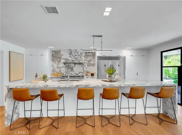 a view of a workspace with furniture