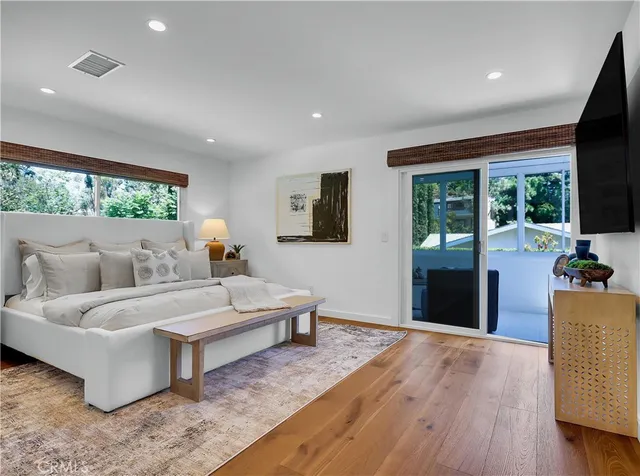 an aerial view of a house with swimming pool garden view and a yard