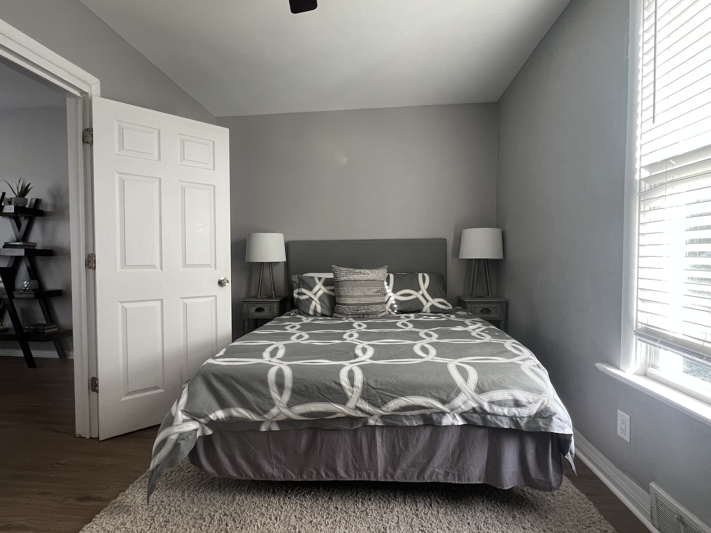 7113 Clarendon Hills Road Darien, IL 60561 - Photo 12 of 35 a bed sitting in a bedroom next to a window