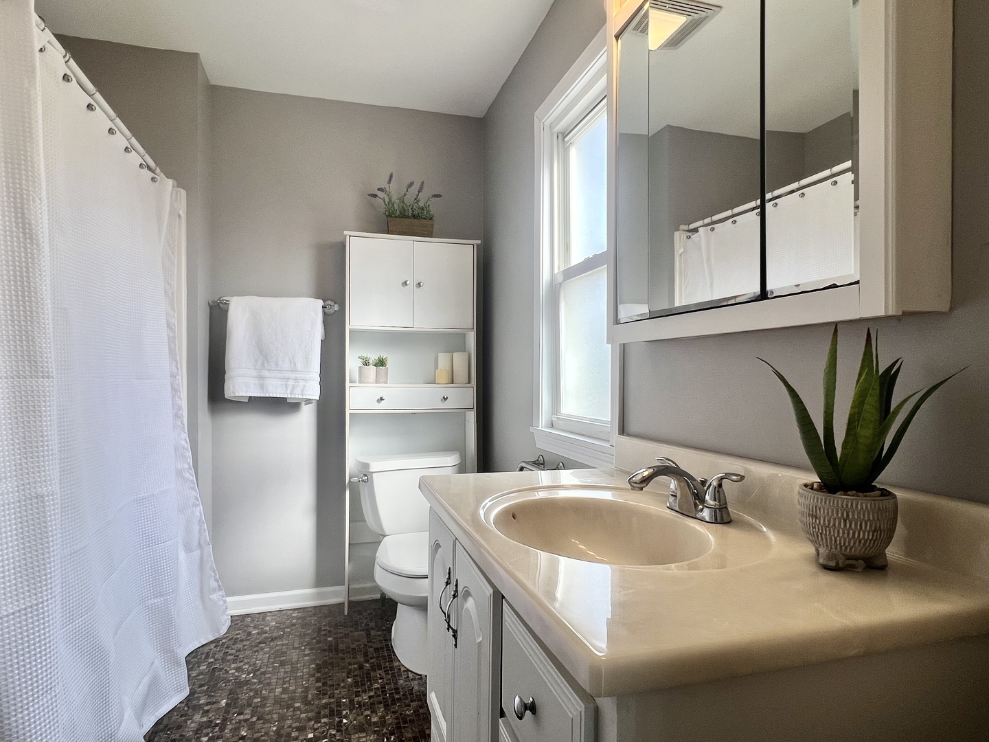 7113 Clarendon Hills Road Darien, IL 60561 - Photo 18 of 35 a bathroom with a sink a toilet and shower