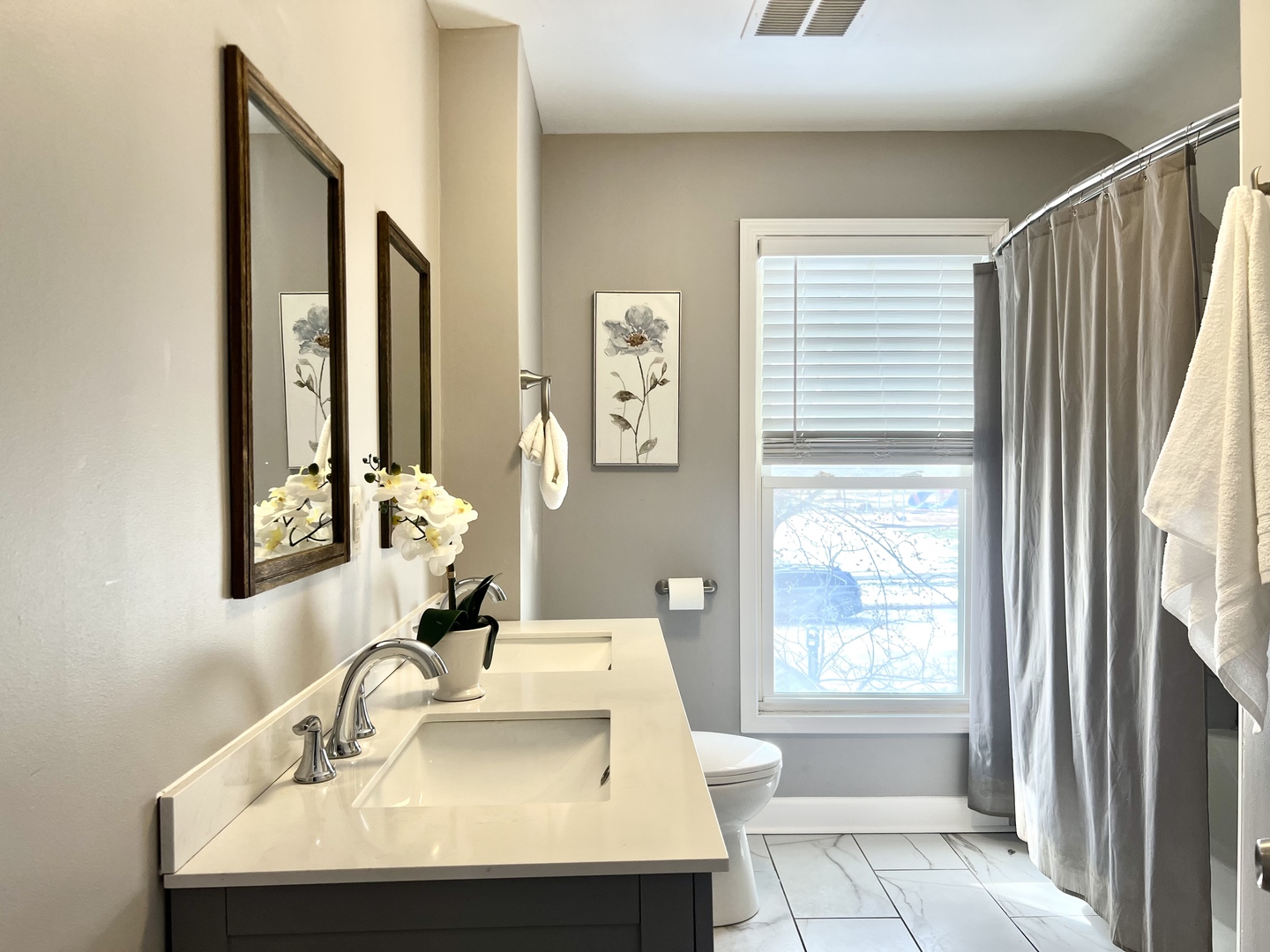 7113 Clarendon Hills Road Darien, IL 60561 - Photo 19 of 35 a bathroom with a sink and a mirror