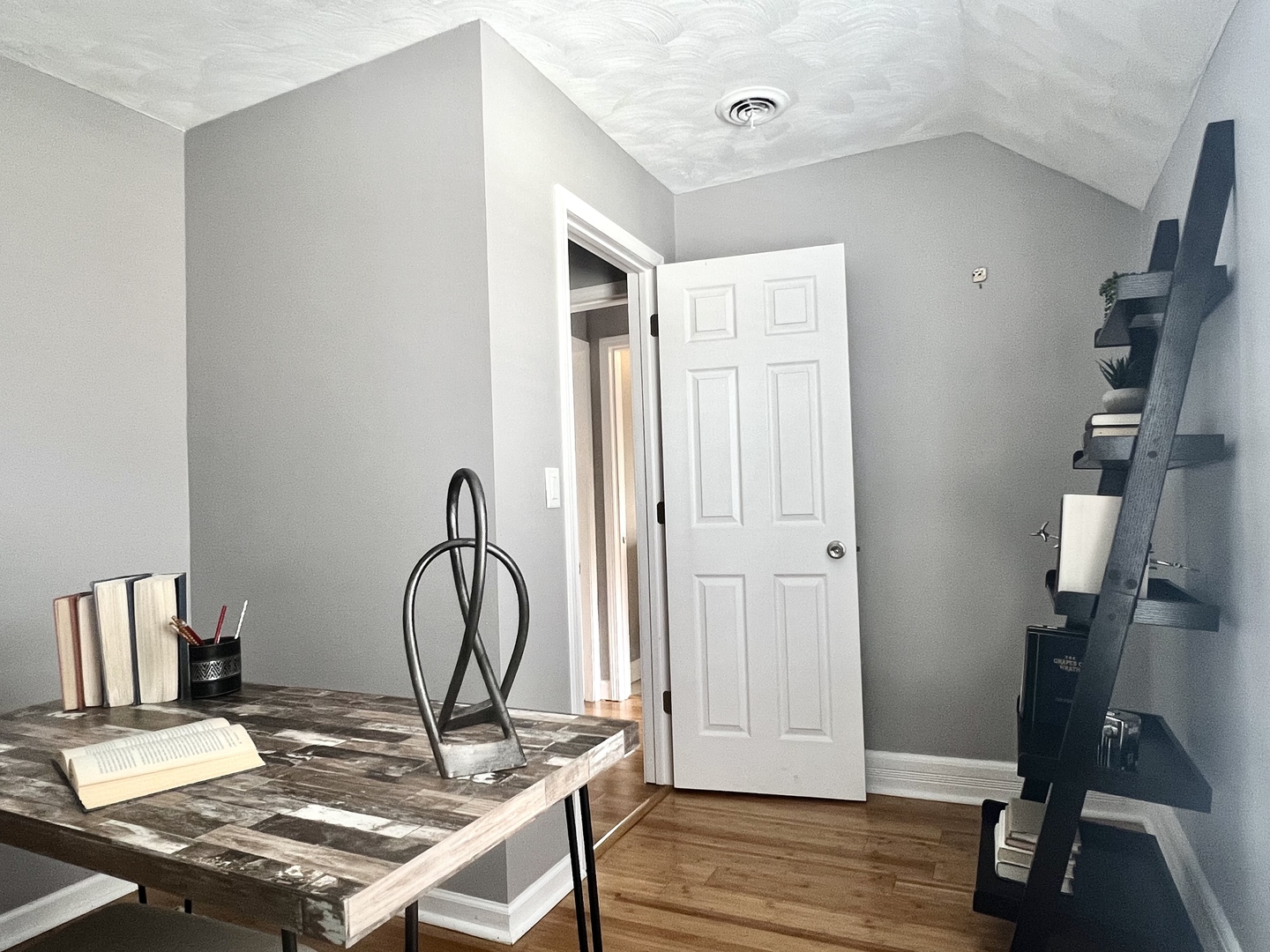 7113 Clarendon Hills Road Darien, IL 60561 - Photo 26 of 35 a view of a workspace with furniture and wooden floor