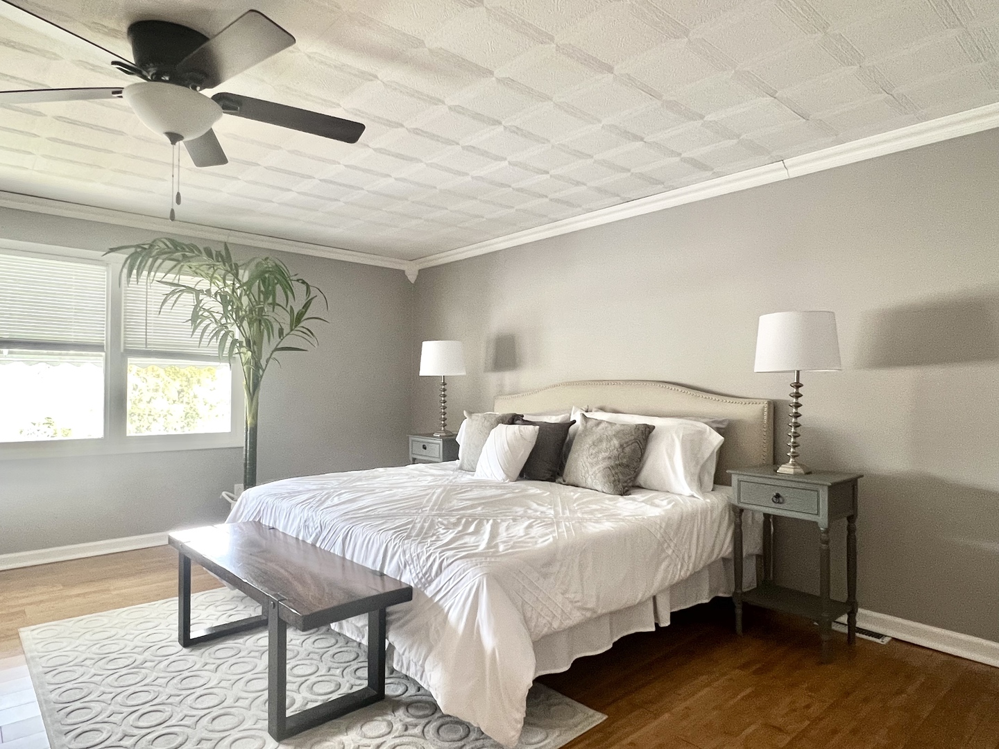 7113 Clarendon Hills Road Darien, IL 60561 - Photo 27 of 35 a bedroom with a bed and a chandelier