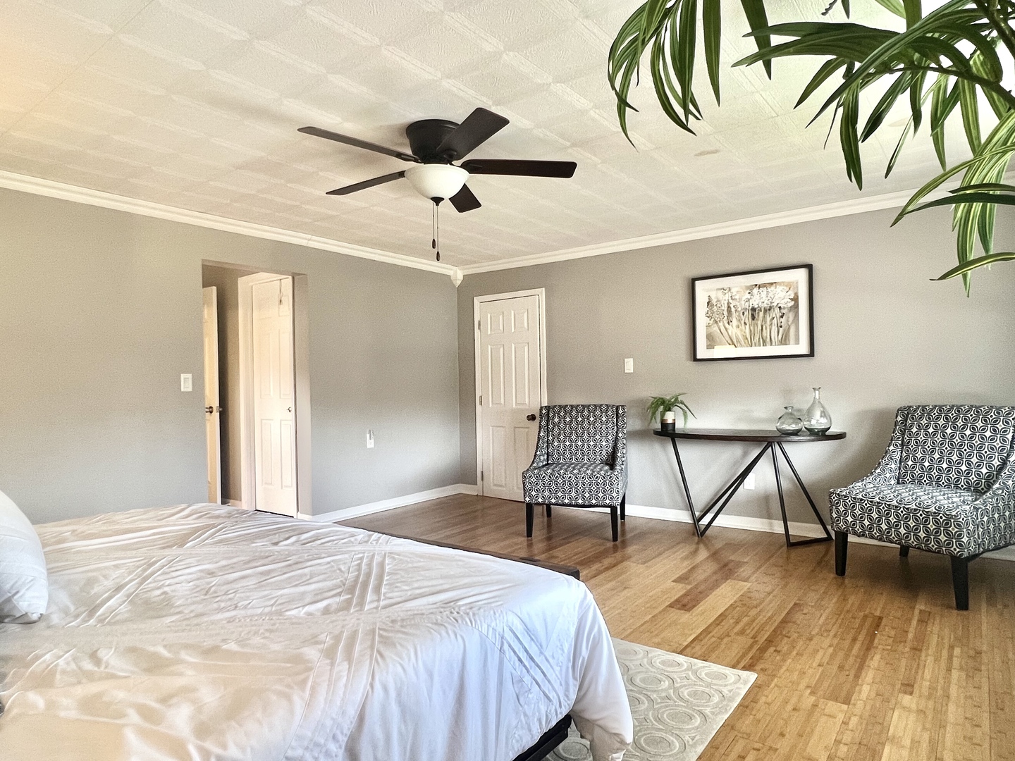 7113 Clarendon Hills Road Darien, IL 60561 - Photo 29 of 35 a bedroom with a bed and a chair