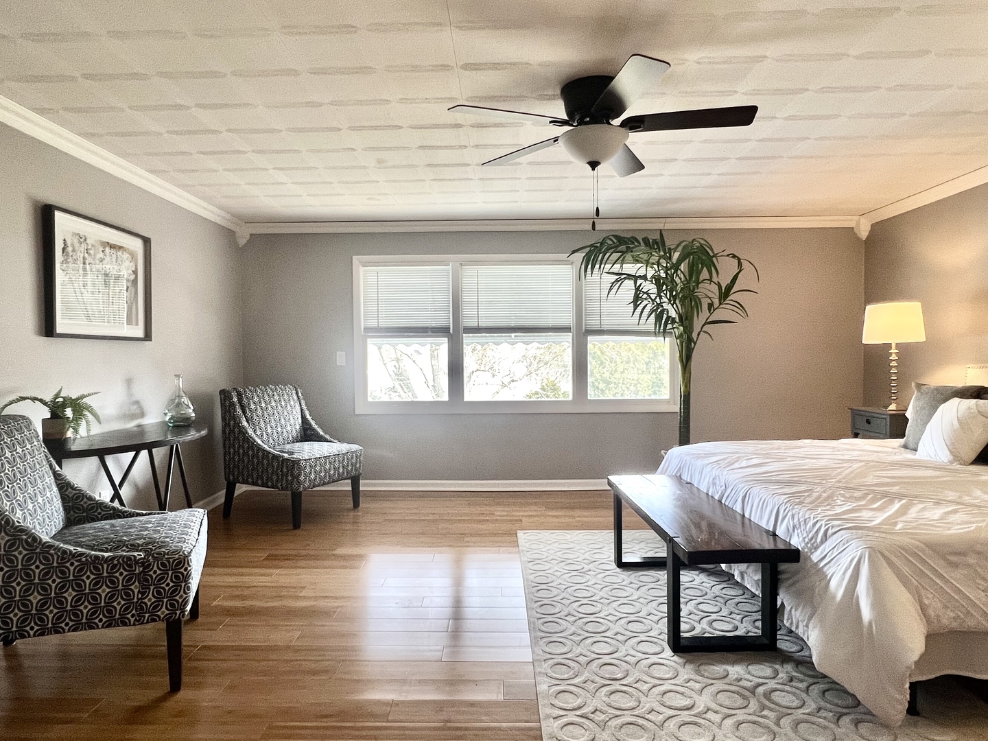 7113 Clarendon Hills Road Darien, IL 60561 - Photo 30 of 35 a bedroom with a bed and wooden floor