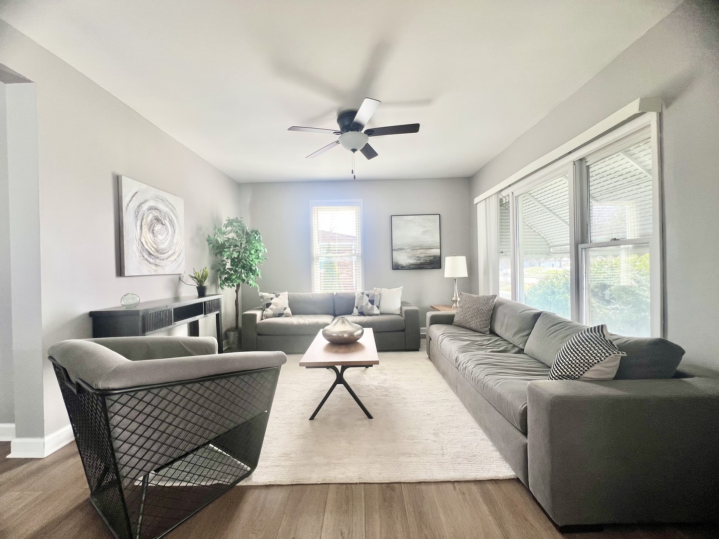 7113 Clarendon Hills Road Darien, IL 60561 - Photo 3 of 35 a living room with furniture and a large window