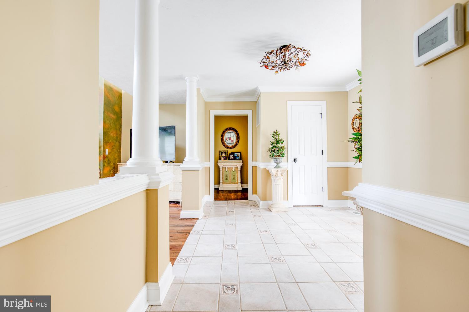 23210 Friendship Road Ruther Glen, VA 22546 - Photo 19 of 58 Foyer leading to powder room