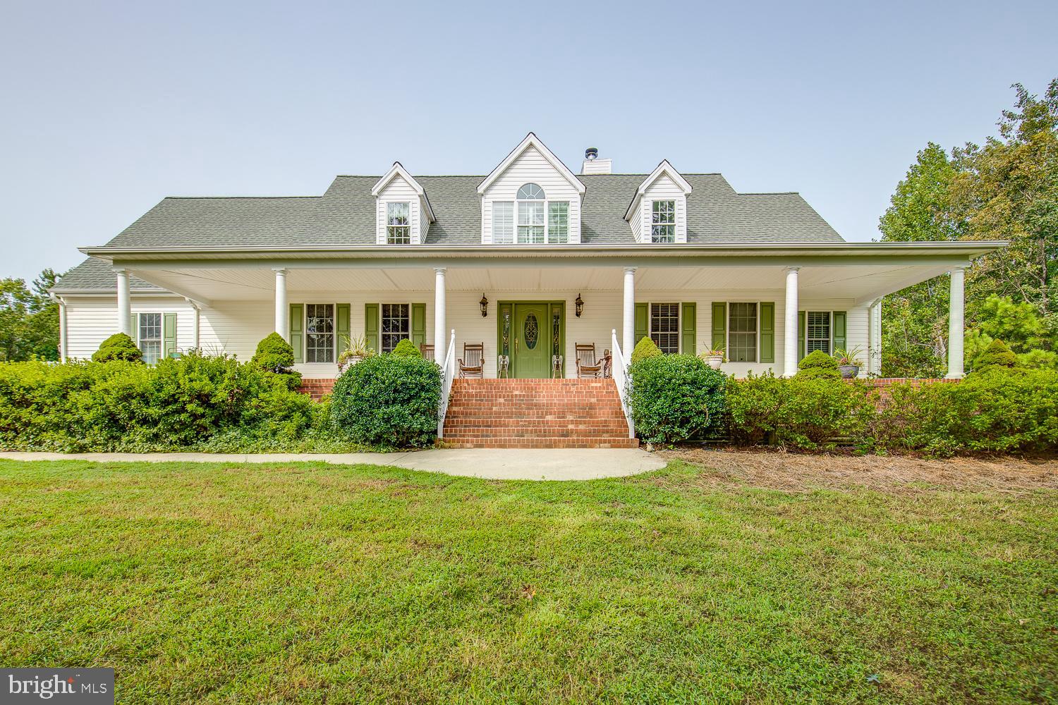 23210 Friendship Road Ruther Glen, VA 22546 - Photo 3 of 58 Front of home with full front porch