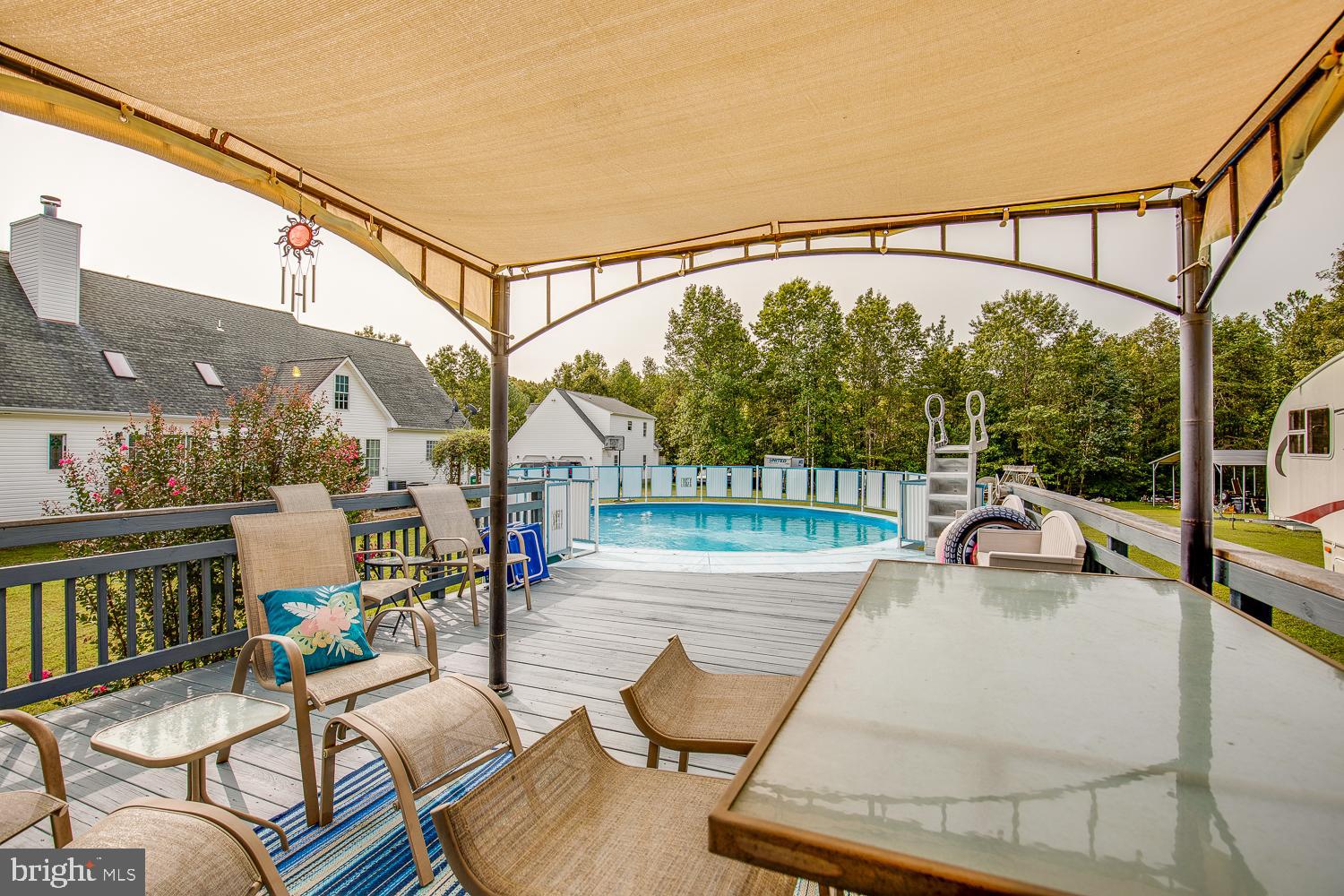 23210 Friendship Road Ruther Glen, VA 22546 - Photo 47 of 58 View of pool from pool deck