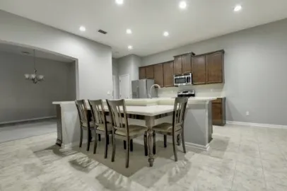 a view of a dining room with furniture